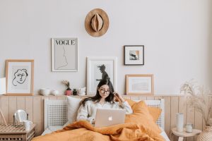 Woman on her laptop in bed
