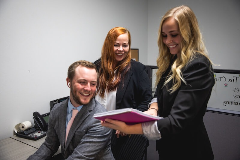 Becca, Tazia, and Kyle working together.